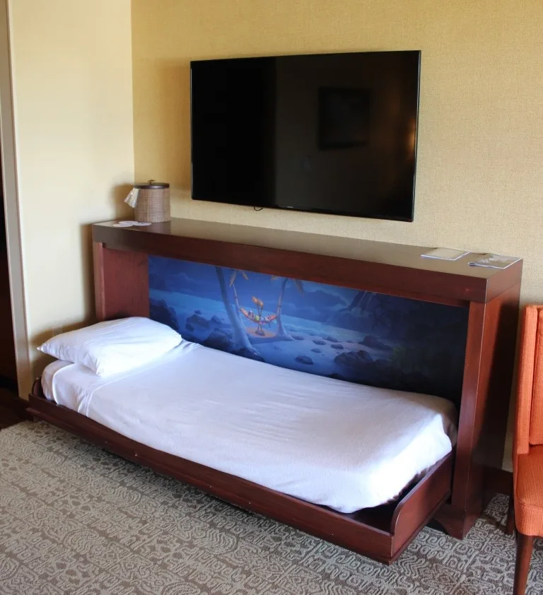 single murphy bed in a dvc studio villa with a tv mounted on the wall above