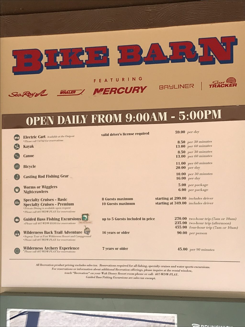 Bike Barn sign with activities and hours 