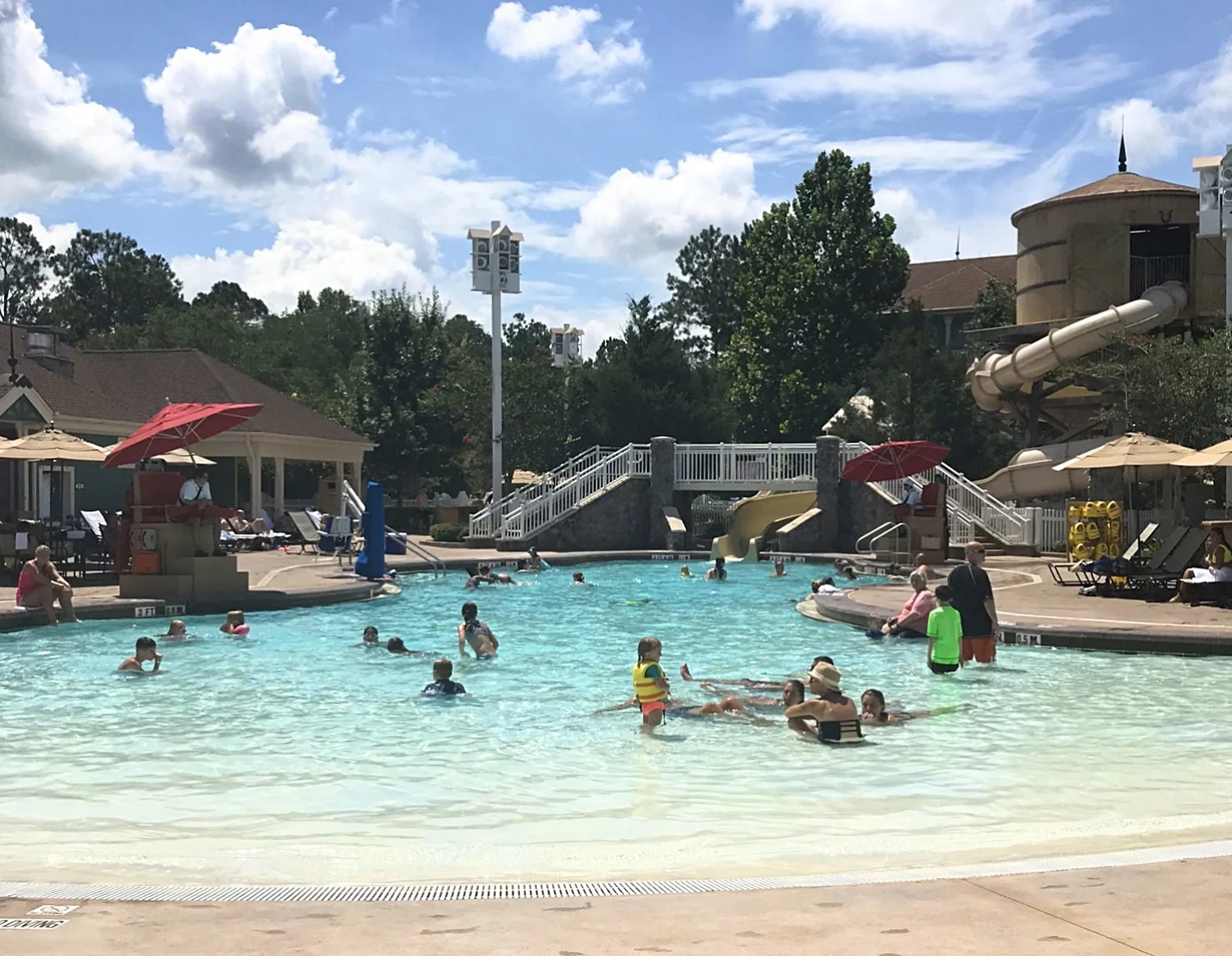 people enjoying the resort pool 