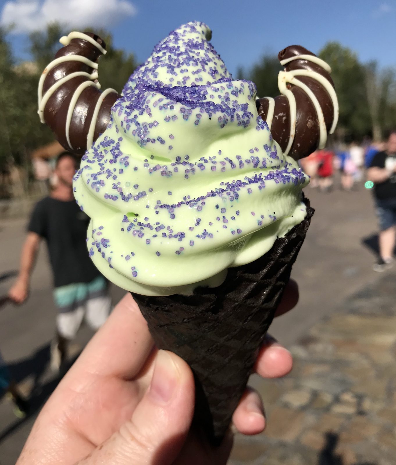 Malificent themed ice cream cone with chocolate horns and purple sprinkles