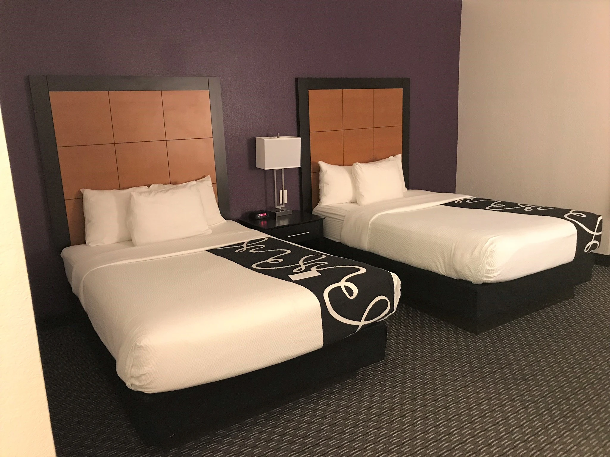 two beds in a room at LaQuinta hotel near the airport