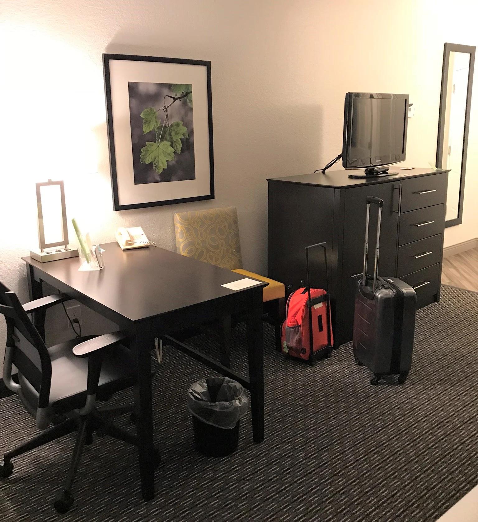 television and desk area in the hotel room