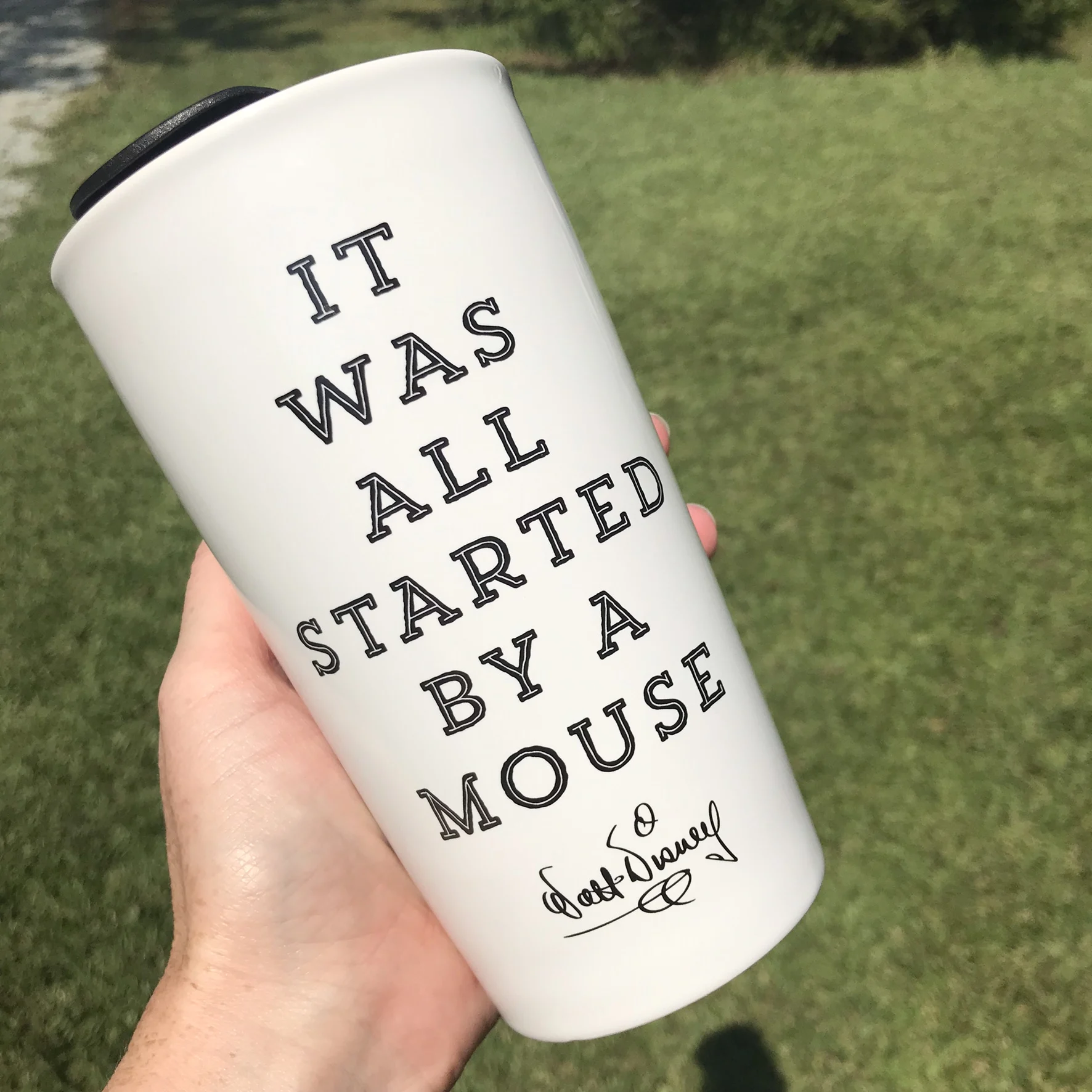 back of the mug with saying - it was all started by a mouse