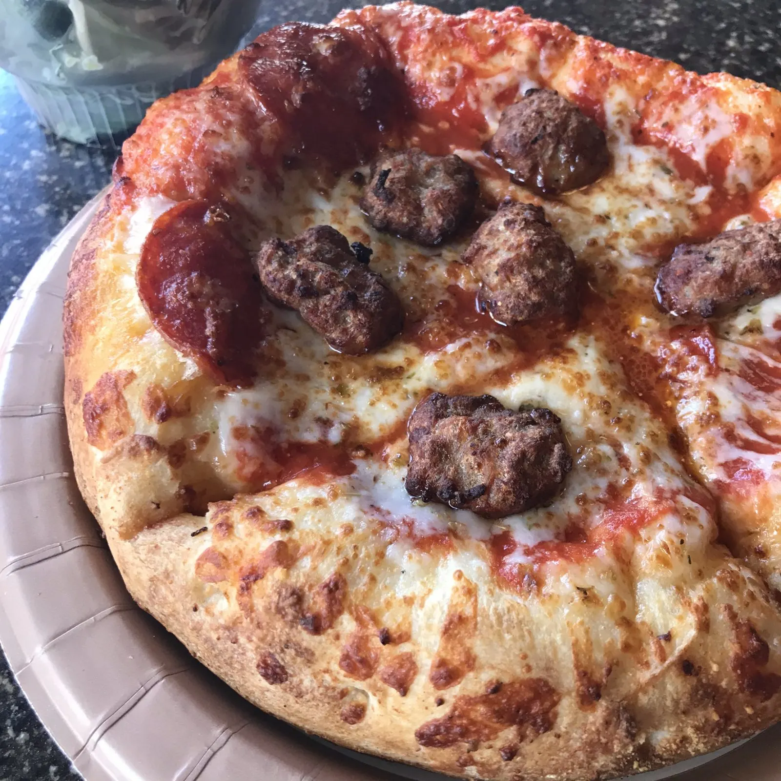 close up of meatlovers pizza