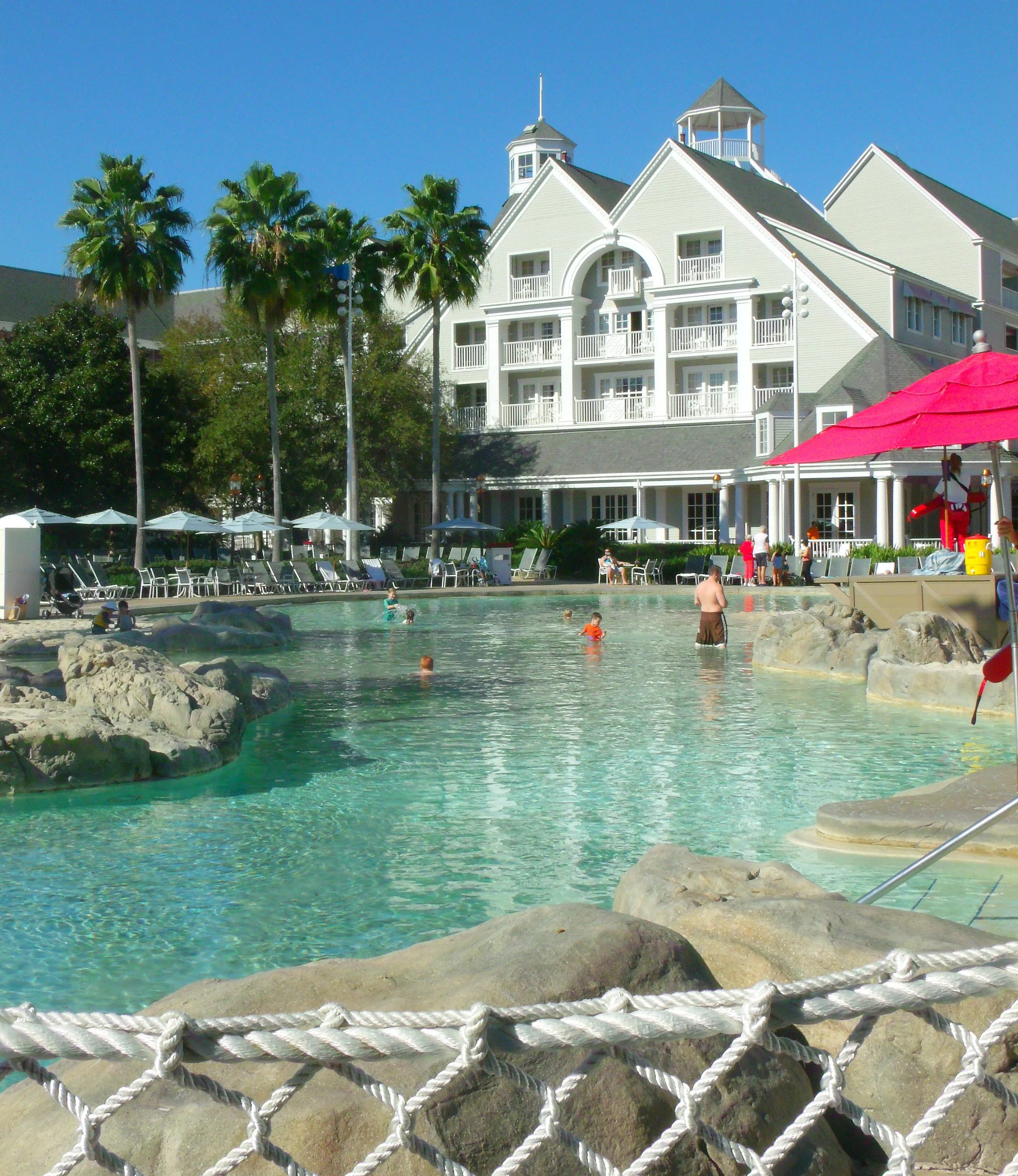 beach club pool area - how to become a disney travel agent