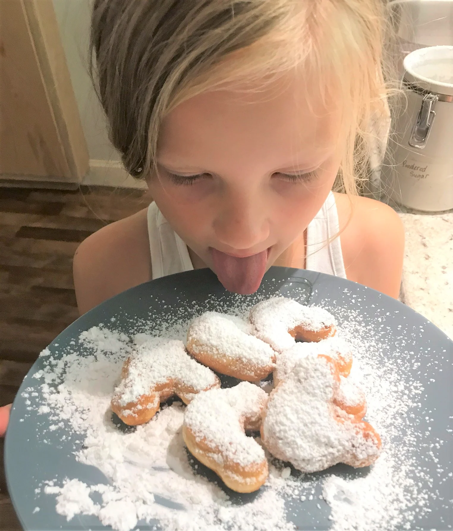 little girl with beignets