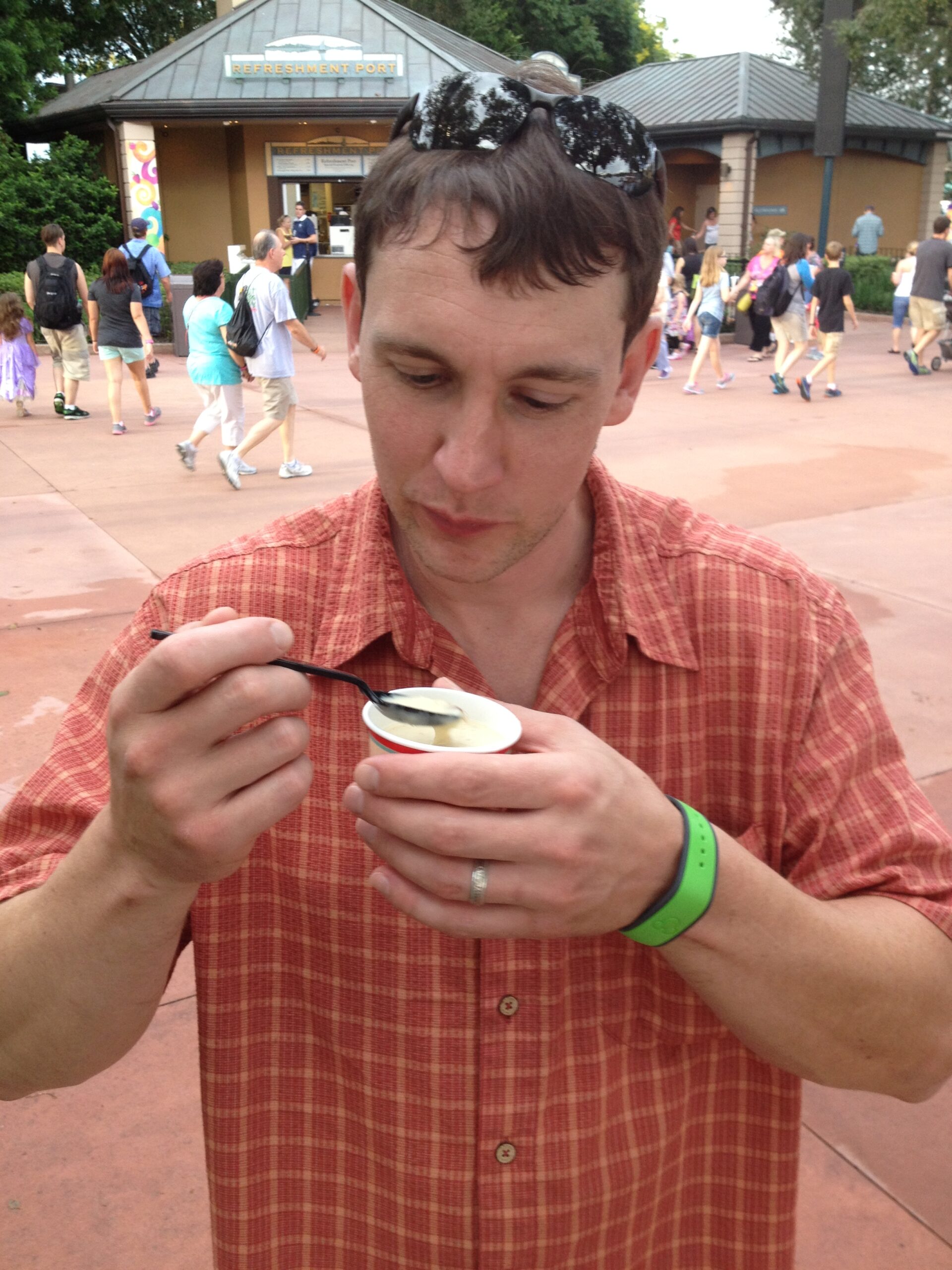 man about to eat canadian cheese soup at epcot