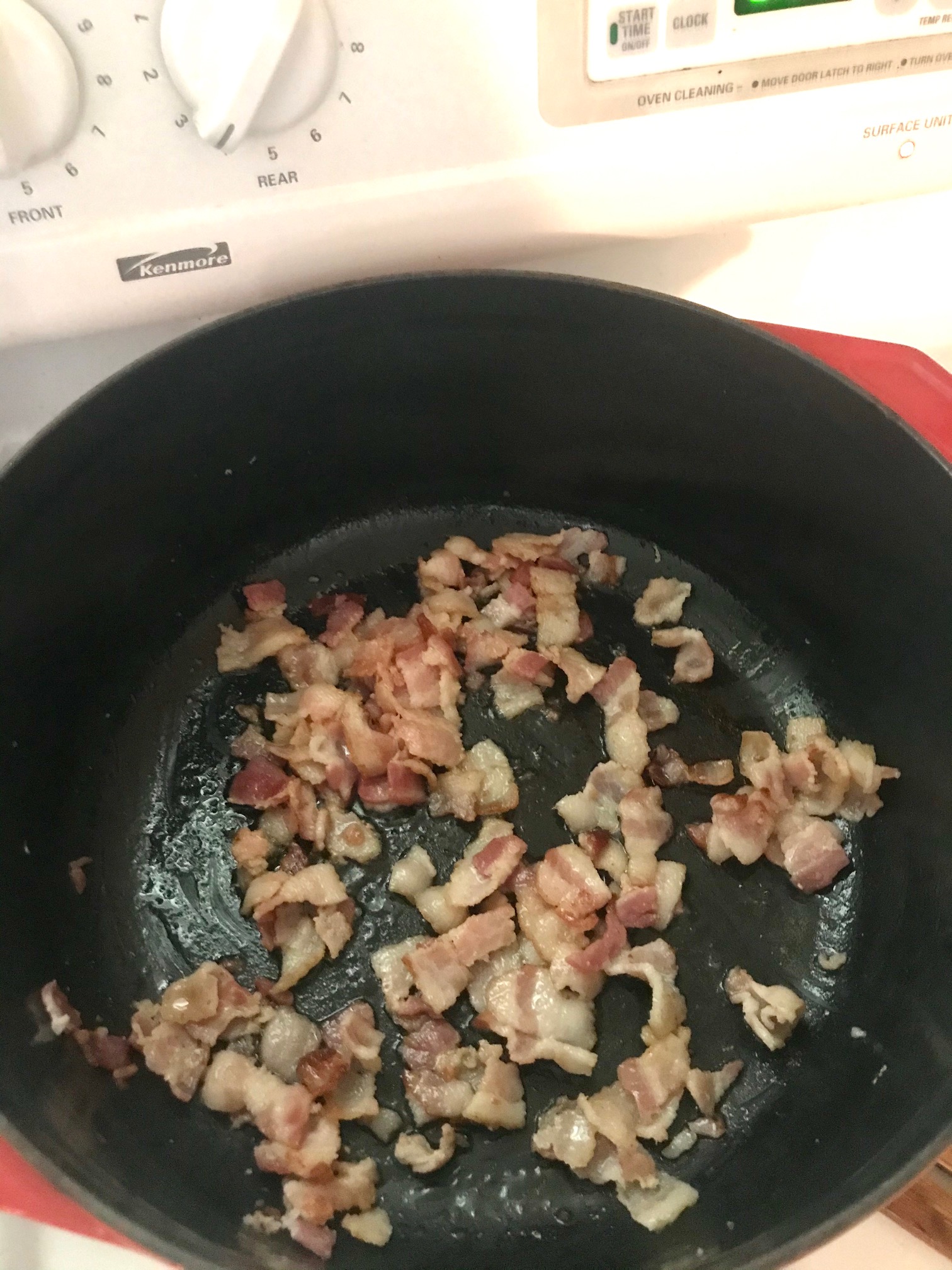 sauteing bacon in a large pot