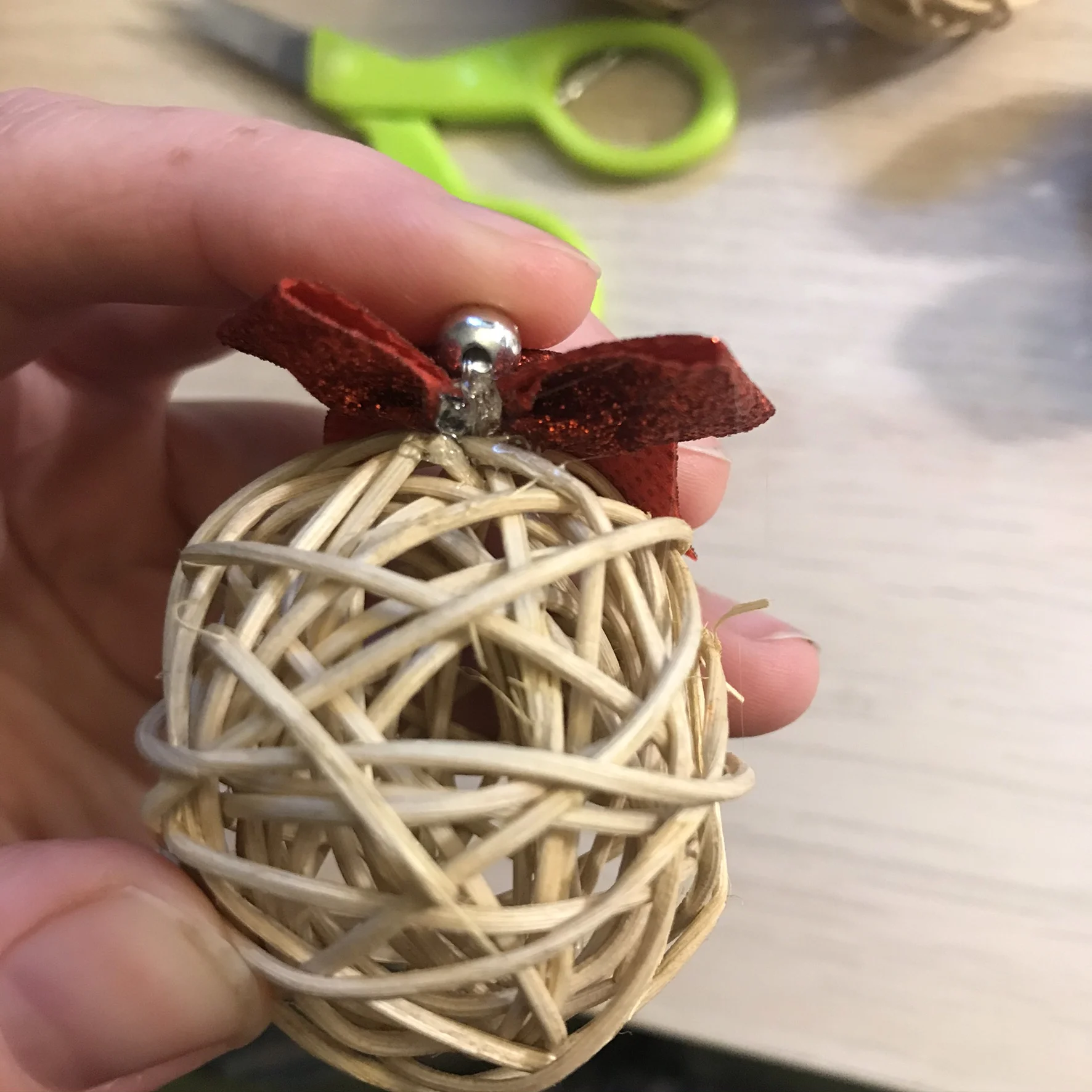 cut off ends of twist tie and hot glue