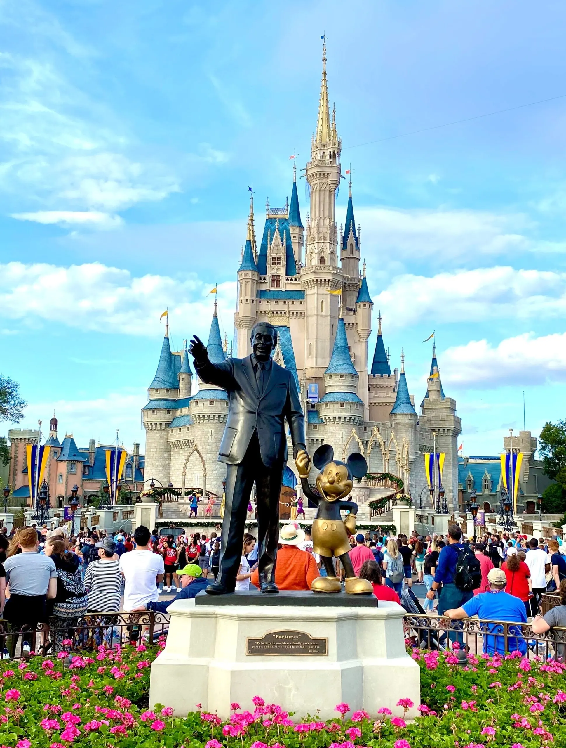 partners statue magic kingdom - how to become a disney travel agent